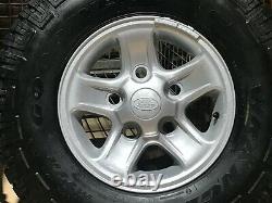 4 x Land Rover Defender 2358516 off-road tyres complete with wheels, unused