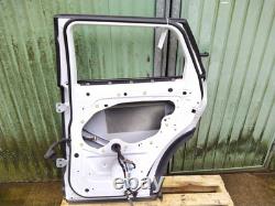 Range Rover Evoque door right off side rear in white poor previous repair 2014