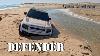 Land Rover Defender Submergé à La Plage De Sealine