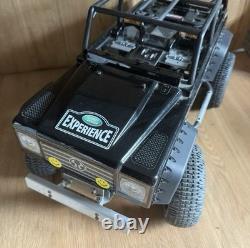 Voiture RC tout terrain Land Rover Axial Tamiya personnalisée jamais utilisée